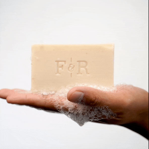 Fulton & Roark Bar Soap with bubbles being held in hand